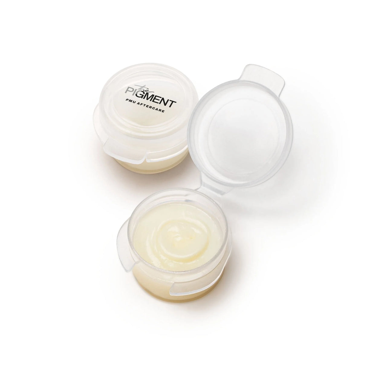 Set of 25 The Pigment Aftercare Balm containers, skincare product for healing and soothing skin after pigmentation treatments.