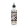 Nocturnal Shine White Legacy — botella sobre fondo blanco, ejemplo de envase de la familia