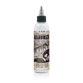 Nocturnal Shine White Legacy — botella sobre fondo blanco, ejemplo de envase de la familia