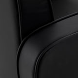 Black Omega Andromeda hairdressing chair with adjustable headrest and armrests, featuring sleek modern design.