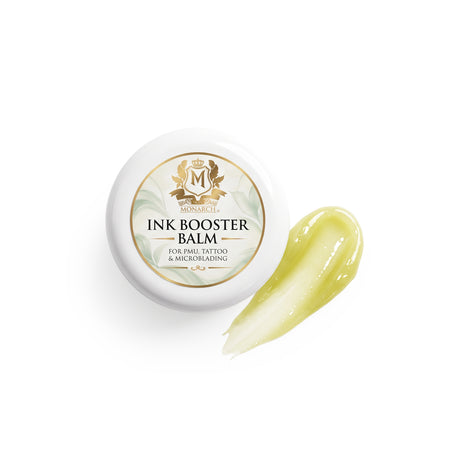 Skin Monarch Ink Booster Balm 30ml, tapa junto a una muestra de bálsamo amarillo brillante