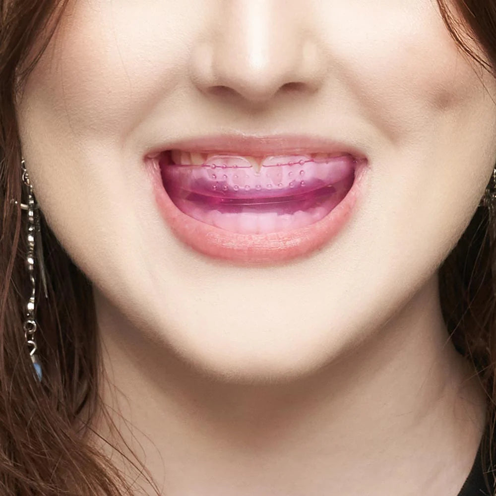 BVShop Ultimate Beauty Lip Assist in Pink, close-up of the hydrating lip balm with a pink tint and smooth texture.